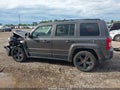 2014 Jeep Patriot — photo 14 of 16 | VIN 1C4NJPBA0ED813419