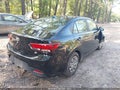 2019 Kia Rio — photo 4 of 16 | VIN 3KPA24ABXKE209889