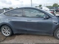 2023 Tesla Model Y — photo 13 of 16 | VIN 7SAYGDEE0PA192378