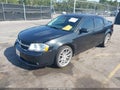 2010 Dodge Avenger — photo 2 of 16 | VIN 1B3CC5FB5AN229077