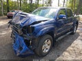 2015 Toyota Tacoma — photo 2 of 17 | VIN 5TFJU4GN4FX081151