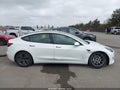 2021 Tesla Model 3 — photo 13 of 16 | VIN 5YJ3E1EA5MF074947