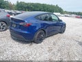 2024 Tesla Model Y — photo 4 of 18 | VIN 7SAYGDEF6RA268620