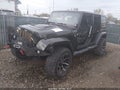 2014 Jeep Wrangler Unlimited — photo 2 of 16 | VIN 1C4HJWEGXEL170252