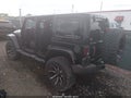 2014 Jeep Wrangler Unlimited — photo 3 of 16 | VIN 1C4HJWEGXEL170252