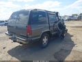 1999 Chevrolet Tahoe — photo 4 of 11 | VIN 1GNEK13R6XJ532669