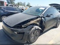 2026 Tesla Model Y — photo 6 of 19 | VIN 7SAYGDED3TF564655