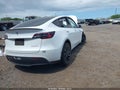 2022 Tesla Model Y — photo 4 of 16 | VIN 7SAYGDEF3NF417059