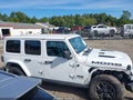 2019 Jeep Wrangler Unlimited — photo 13 of 16 | VIN 1C4HJXEGXKW554953