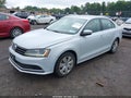 2017 Volkswagen Jetta — photo 2 of 12 | VIN 3VW2B7AJ1HM412033