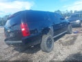 2013 Chevrolet Suburban 1500 — photo 4 of 17 | VIN 1GNSKJE70DR134806