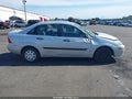 2004 Ford Focus — photo 13 of 16 | VIN 1FAFP33Z44W124668