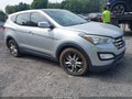 2013 Hyundai Santa Fe — photo 1 of 10 | VIN 5XYZWDLA2DG005038
