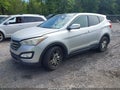 2013 Hyundai Santa Fe — photo 2 of 10 | VIN 5XYZWDLA2DG005038