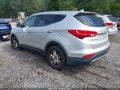 2013 Hyundai Santa Fe — photo 3 of 10 | VIN 5XYZWDLA2DG005038