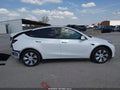 2023 Tesla Model Y — photo 14 of 23 | VIN 7SAYGDEE6PA119645