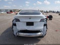 2023 Tesla Model Y — photo 17 of 23 | VIN 7SAYGDEE6PA119645