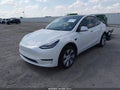 2023 Tesla Model Y — photo 2 of 23 | VIN 7SAYGDEE6PA119645