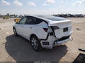 2023 Tesla Model Y — photo 3 of 23 | VIN 7SAYGDEE6PA119645