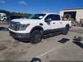 2016 Nissan Titan — photo 2 of 17 | VIN 1N6BA1F42GN512620