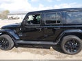 2023 Jeep Wrangler — photo 14 of 16 | VIN 1C4JJXP65PW556610