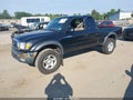 2003 Toyota Tacoma — photo 2 of 16 | VIN 5TEWM72N13Z257107