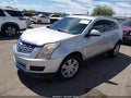 2016 Cadillac SRX — photo 2 of 14 | VIN 3GYFNBE33GS573031