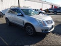 2013 Cadillac SRX — photo 1 of 16 | VIN 3GYFNJE37DS511413