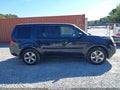 2012 Honda Pilot — photo 13 of 18 | VIN 5FNYF4H52CB079010