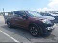 2018 Honda Ridgeline — photo 13 of 16 | VIN 5FPYK2F64JB002011