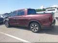 2018 Honda Ridgeline — photo 14 of 16 | VIN 5FPYK2F64JB002011