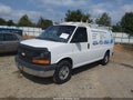 2015 Chevrolet Express 2500 — photo 2 of 17 | VIN 1GCWGFCG7F1228355