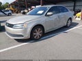 2013 Volkswagen Jetta — photo 2 of 11 | VIN 3VWDX7AJ5DM272346