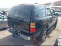 2004 Chevrolet Tahoe — photo 4 of 11 | VIN 1GNEC13Z24R116354
