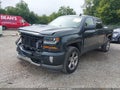 2018 Chevrolet Silverado 1500 — photo 2 of 19 | VIN 3GCUKREC7JG299762