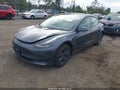 2022 Tesla Model 3 — photo 2 of 15 | VIN 5YJ3E1EB2NF334991