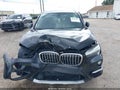 2018 BMW X1 — photo 13 of 17 | VIN WBXHU7C34J5H42031