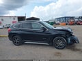 2018 BMW X1 — photo 14 of 17 | VIN WBXHU7C34J5H42031