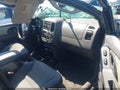 2004 Ford Escape — photo 5 of 17 | VIN 1FMYU93104DA04284