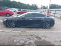 2017 Tesla Model S — photo 14 of 16 | VIN 5YJSA1E28HF229934