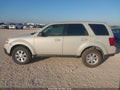 2009 Mazda Tribute — photo 14 of 16 | VIN 4F2CZ02739KM06921