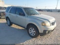 2009 Mazda Tribute — photo 1 of 16 | VIN 4F2CZ02739KM06921