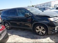 2018 Honda Pilot — photo 13 of 18 | VIN 5FNYF6H52JB012660
