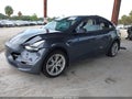 2023 Tesla Model Y — photo 2 of 14 | VIN 7SAYGDEE8PA155482
