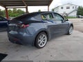 2023 Tesla Model Y — photo 4 of 14 | VIN 7SAYGDEE8PA155482