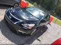 2014 Nissan Altima — photo 2 of 16 | VIN 1N4AL3AP9EN207558