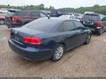 2014 Volkswagen Passat — photo 4 of 11 | VIN 1VWAP7A35EC006090