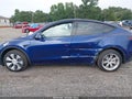 2023 Tesla Model Y — photo 14 of 18 | VIN 7SAYGDEE3PF768869