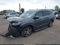 2017 Honda Pilot — photo 2 of 16 | VIN 5FNYF6H90HB105058