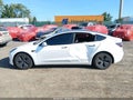 2023 Tesla Model 3 — photo 14 of 20 | VIN 5YJ3E1EAXPF573456